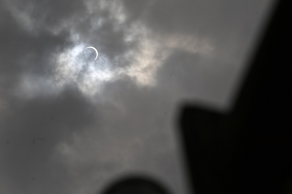 The partial solar eclipse  blocked by some clouds as seen in Petaling Jaya at 1.25pm December, 2019. u00e2u20acu201d Picture by Choo Choy May