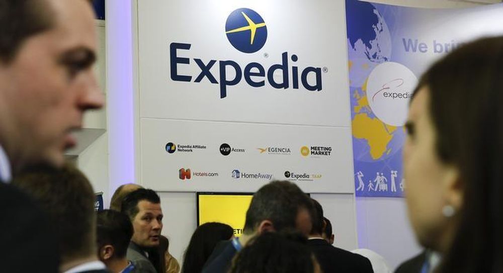 Visitors browse at the stand of global online travel brand Expedia during the International Tourism Trade Fair (ITB) in Berlin, Germany, March 9, 2016. u00e2u20acu201d Reuters pic
