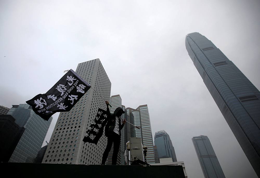 An anti-government protester waves a flag during a rally at Edinburgh Place in Hong Kong December 29, 2019. u00e2u20acu201d Reuters pic