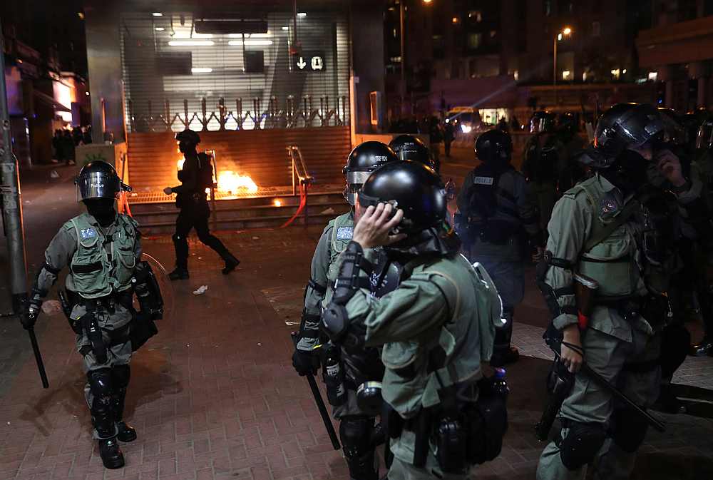 Police clear an area after protesters throw Molotov cocktails at an MTR station in Hung Hom in Hong Kong December 1, 2019. u00e2u20acu201d Reuters pic