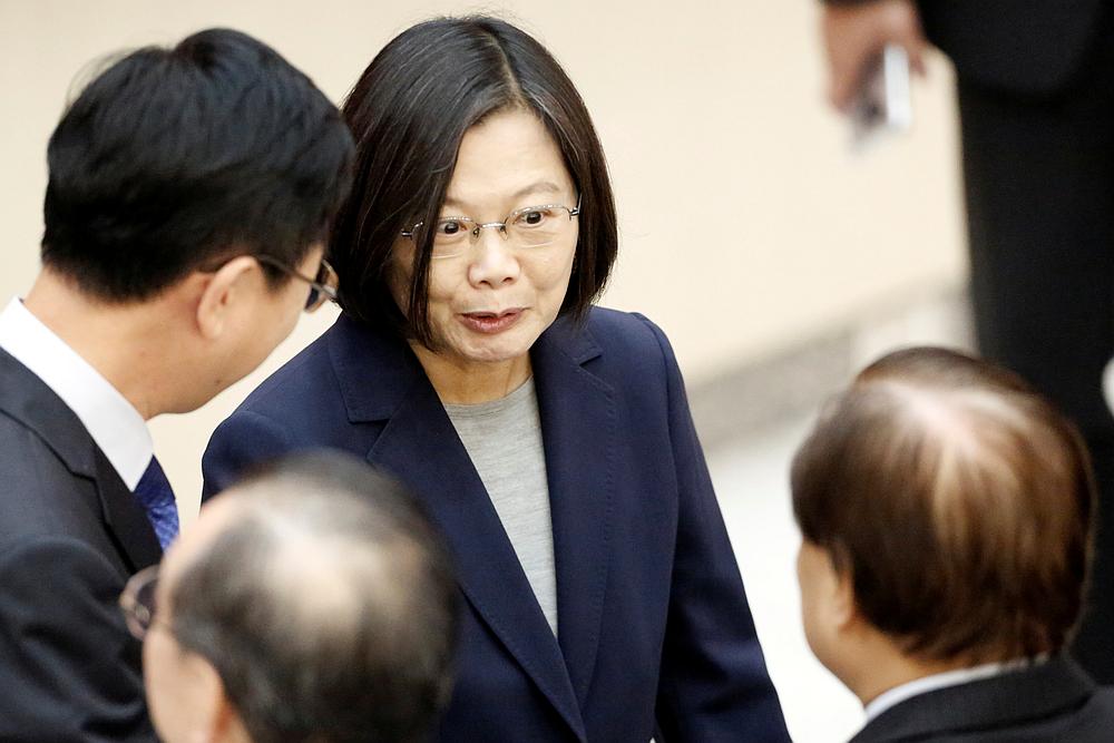 Taiwan President Tsai Ing-wen congratulates the agents after the graduation ceremony for the Investigation Bureau agents in New Taipei City December 26 , 2019. u00e2u20acu201d Reuters pic