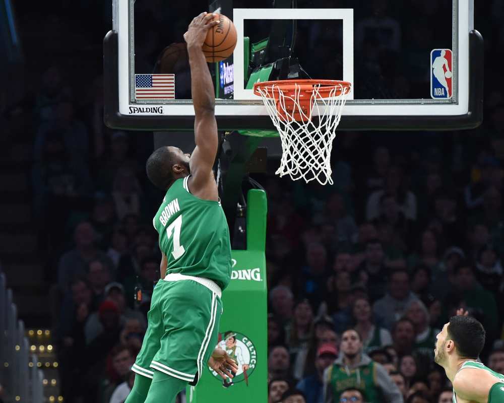 Boston Celtics guard Jaylen Brown (7) dunks the ball during the second half against the Cleveland Cavaliers at TD Garden. u00e2u20acu2022 Bob DeChiara-USA TODAY Sports pic via Reuters