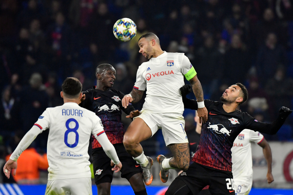 Memphis Depay vies with RB Leipzigu00e2u20acu2122s Brazilian forward Matheus Cunha during the Uefa Champions League group G football match December 10, 2019 at the Parc Olympique Lyonnais stadium in Decines-Charpieu near Lyon. u00e2u20acu201d AFP pic 