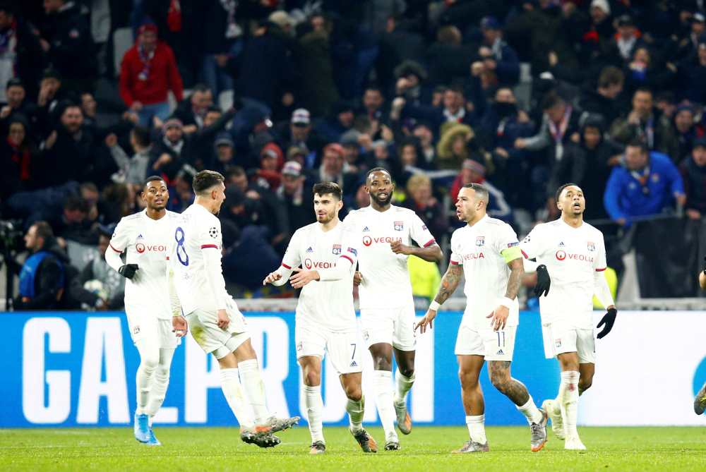 Olympique Lyonnais players celebrate after Memphis Depay scored the second goal against RB Leipzig December 11, 2019. u00e2u20acu2022 Reuters pic