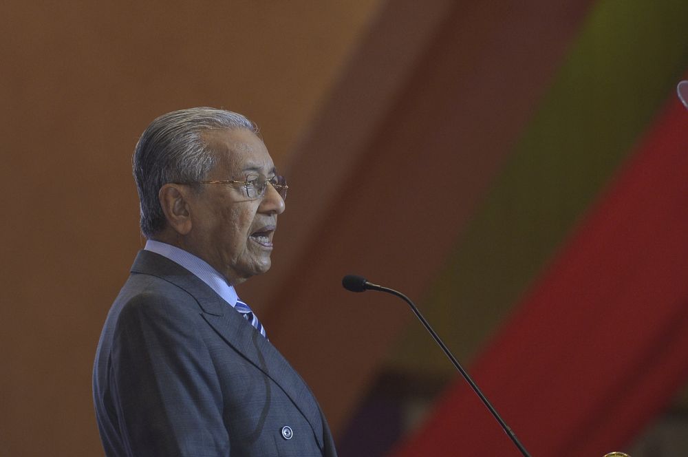 Prime Minister Tun Dr Mahathir Mohamad delivers a speech during the signing ceremony between TRX City and IWH CREC to develop Bandar Malaysia in Putrajaya December 17, 2019. u00e2u20acu2022 Picture by Shafwan Zaidon