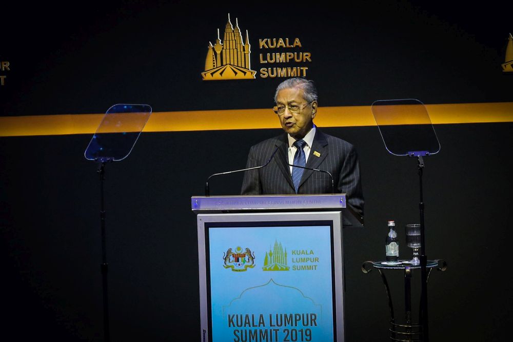 Prime Minister Tun Dr Mahathir Mohamad delivers his opening speech during the Kuala Lumpur Summit 2019 at the Kuala Lumpur Convention Centre December 19, 2019. u00e2u20acu201d Picture by Hari Anggara