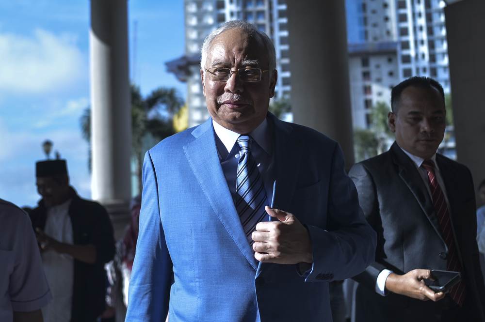 Former prime minister Datuk Seri Najib Razak arrives at the Kuala Lumpur High Court Complex December 18, 2019. u00e2u20acu2022 Picture by Shafwan Zaidon