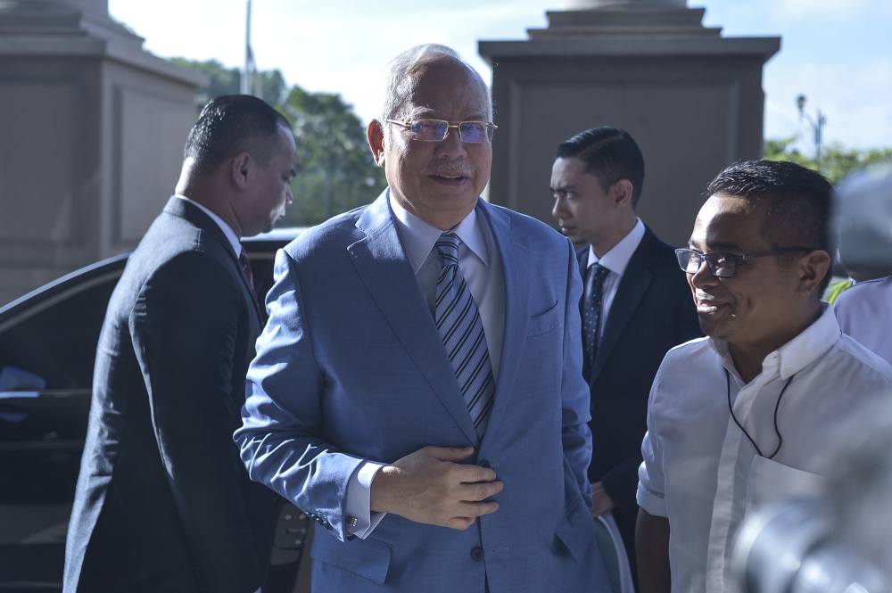 Former prime minister Datuk Seri Najib Razak arrives at the Kuala Lumpur High Court Complex December 18, 2019. u00e2u20acu2022 Picture by Shafwan Zaidon