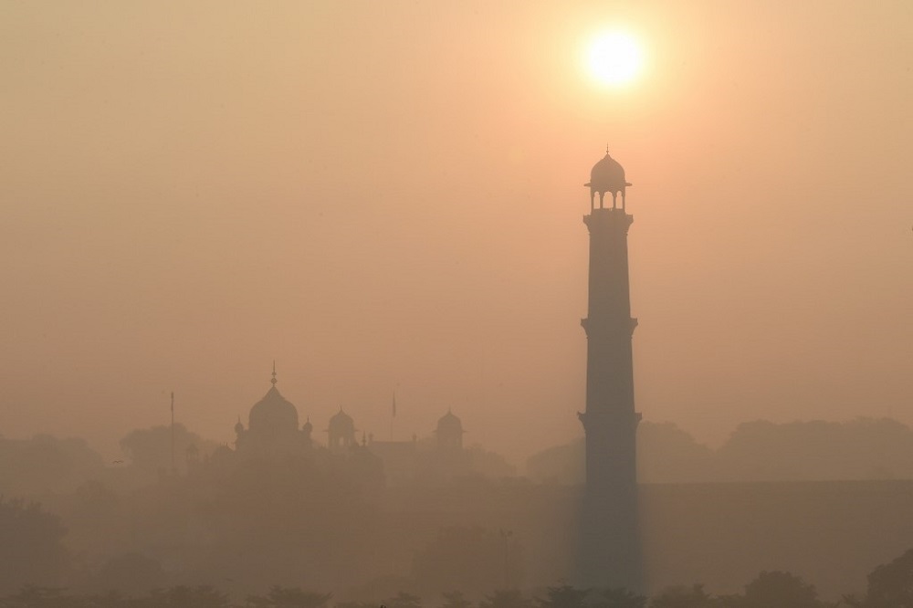 This picture taken on December 6, 2019 shows heavy smog conditions around Badshahi Mosque in Lahore. u00e2u20acu201d AFP pic
