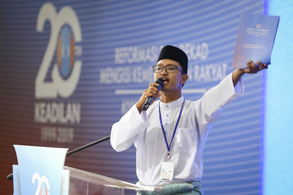 Perak delegate Mohamad Rukhairil Aizat Mohd Maharani speaks during the 2019 PKR Youth Congress at the Classic Ballroom at MITC in Melaka December 6, 2019. u00e2u20acu2022 Picture by Yusof Mat Isa