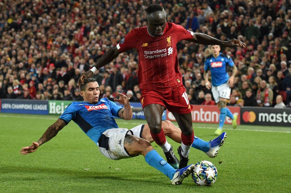 File picture shows Liverpoolu00e2u20acu2122s Senegalese striker Sadio Mane vying with Napoliu00e2u20acu2122s Brazilian defender Allanduring the UEFA Champions League Group E match between Liverpool and Napoli at Anfield in Liverpool, on November 27, 2019. u00e2u20acu201d AFP pic