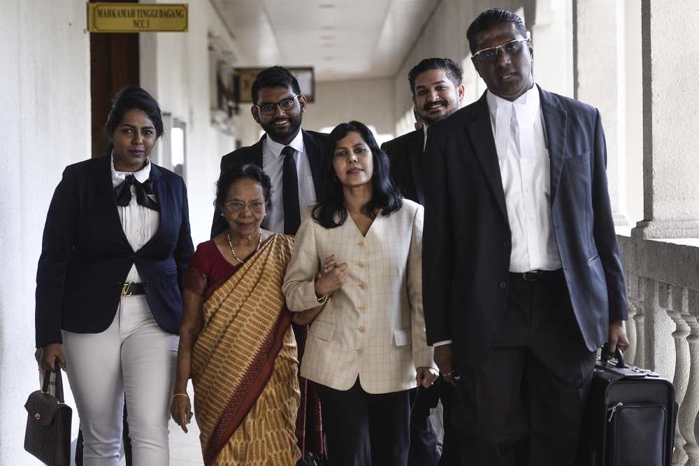 E. Meeriam Rosaline (second right) is seen at the Kuala Lumpur High Court December 17, 2019. u00e2u20acu2022 Picture by Miera Zulyana