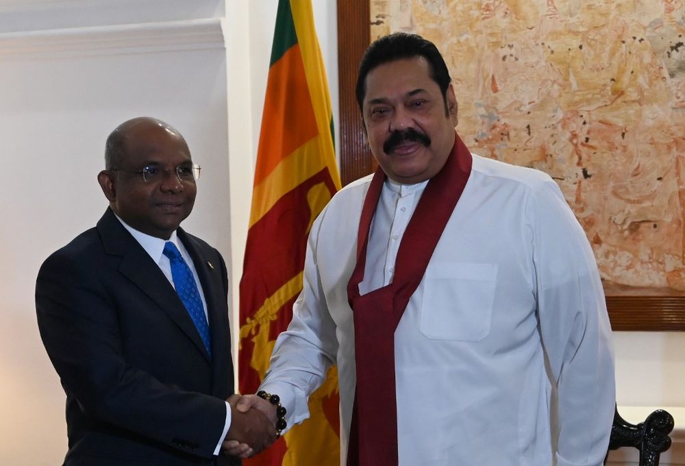 Sri Lankau00e2u20acu2122s Prime Minister Mahinda Rajapaksa (right) shakes hands with Maldivesu00e2u20acu2122 Foreign Minister Abdulla Shahid during a meeting in Colombo on December 5, 2019. u00e2u20acu201d AFP pic