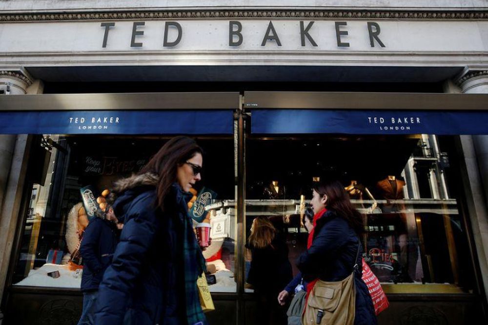 Shoppers walk past a Ted Baker store on Regents Street in London, December 17, 2018. u00e2u20acu201d Reuters pic