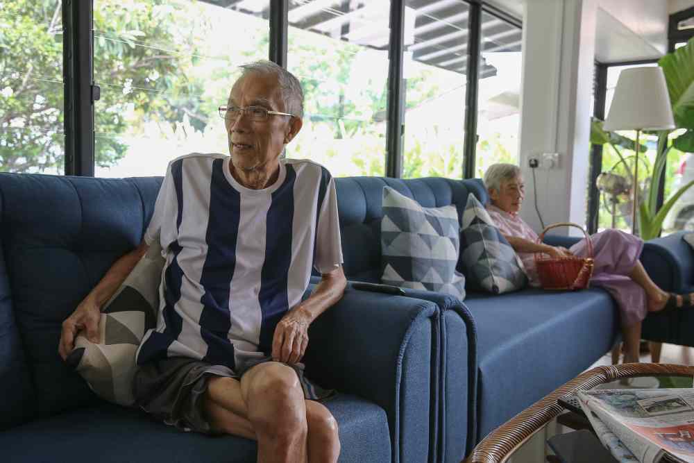 Raymond Low (left) is currently recuperating in The Mansion following surgery for intestine cancer. u00e2u20acu201d Picture by Yusof Mat Isa