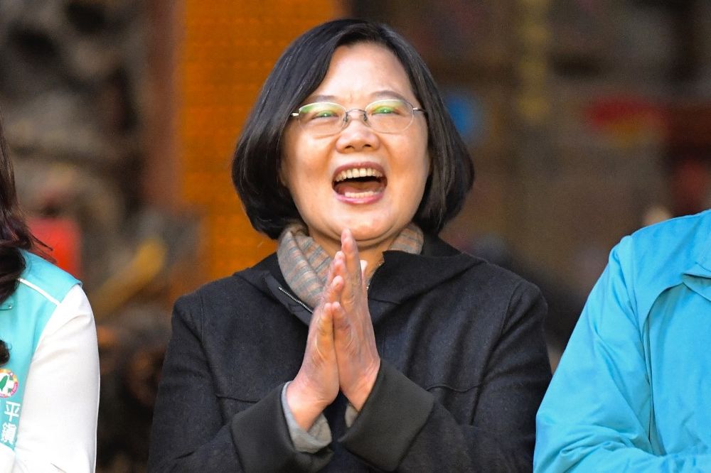 Taiwan's President and 2020 presidential candidate Tsai Ing-wen clapping during an election campaign event at the Jienan Taoist temple in Pingzhang district in Taoyuan,  December 3, 2019. u00e2u20acu201d AFP pic