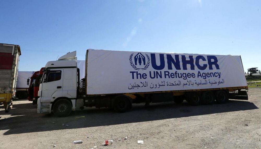Trucks carrying humanitarian supplies wait in front of Turkey's Nusaybin border post in Mardin province March 20, 2014. u00e2u20acu201d Reuters pic