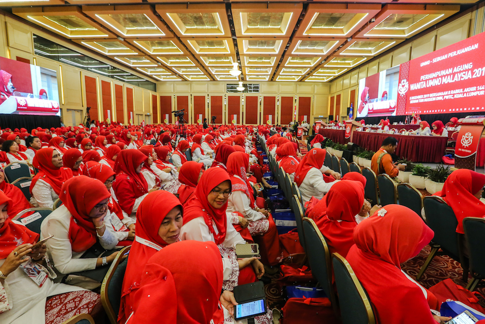 Wanita Umno delegates attend the 2019 Umno General Assembly at Putra World Trade Centre in Kuala Lumpur December 5, 2019. u00e2u20acu201d Picture by Firdaus Latif