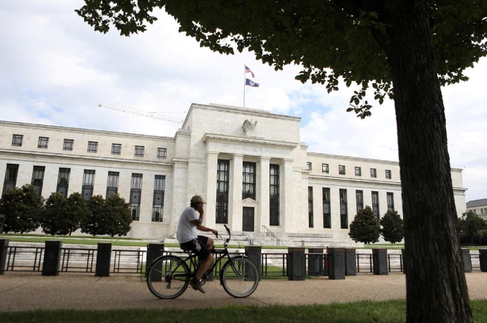 A cyclist passes the Federal Reserve building in Washington  DC, August 22, 2018. u00e2u20acu201d Reuters pic