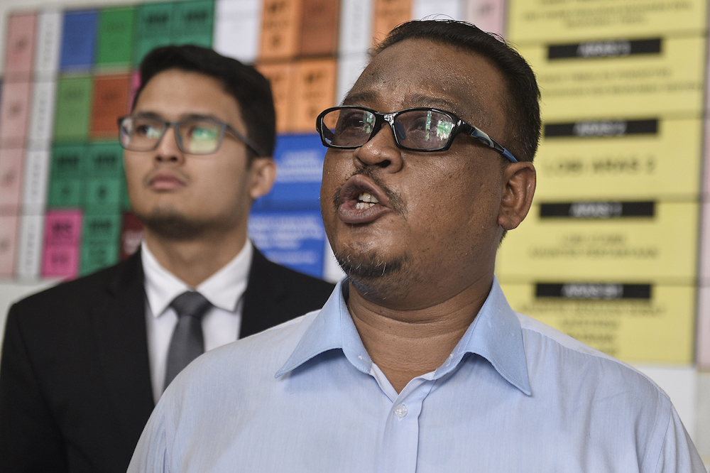Mohd Khairul Azam Abdul Aziz speaks to reporters at the Kuala Lumpur High Court December 17, 2019. — Picture by Miera Zulyana