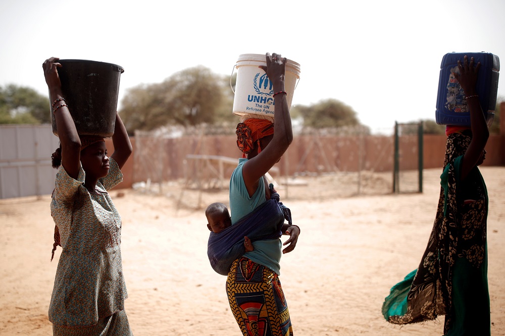Women fetch water during the regional anti-insurgent Operation Barkhane in Tin Hama, Mali October 19, 2017. u00e2u20acu201d Reuters pic