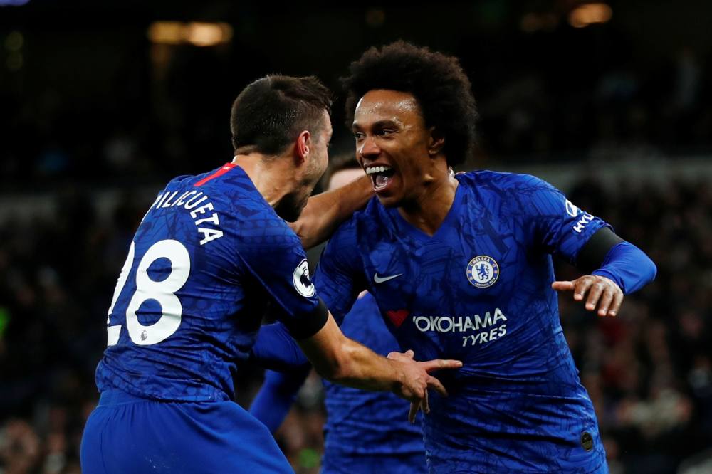 Chelsea's Willian (right) celebrates after scoring the second goal from the penalty spot against Tottenham Hotspur December 23, 2019. u00e2u20acu2022 Reuters pic