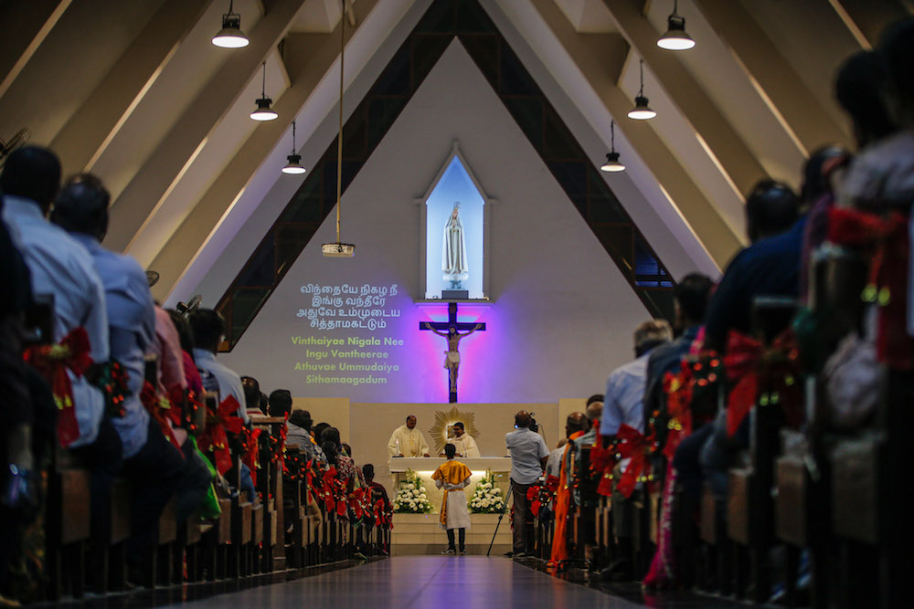 People attend Christmas Eve Mass at the Church of Our Lady of Fatima in Brickfields, Kuala Lumpur December 24, 2019. u00e2u20acu201d Picture by Hari Anggara