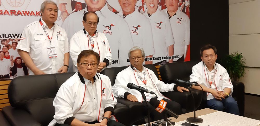Sarawak Chief Minister Datuk Patinggi Abang Johari Openg (seated left) speaking to reporters after the closing of GPS Convention, November 16 2019. u00e2u20acu201d Picture by Sulok Tawie