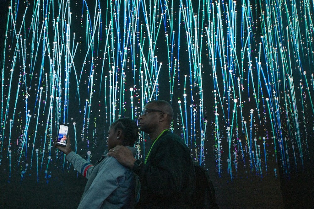 People watch an immersive video introduction to Qualcomm 5G technology at the Las Vegas Convention Centre during CES 2019 in Las Vegas January 9, 2019. u00e2u20acu201d AFP pic