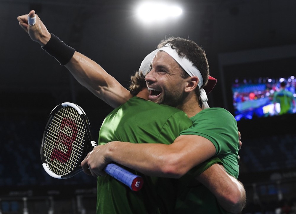 Grigor Dimitrov of Bulgaria celebrates with teammates after he and Alexandar Lazarov won their menu00e2u20acu2122s doubles match against Jamie Murray and Joe Salisbury of Britain at the ATP Cup in Sydney January 4, 2020. u00e2u20acu201d AFP pic