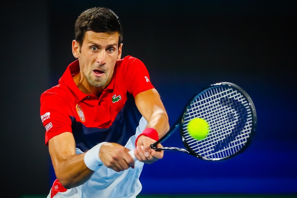 Novak Djokovic of Serbia hits a return against Kevin Anderson of South Africa during their menu00e2u20acu2122s singles match on day two of the ATP Cup in Brisbane January 4, 2020. u00e2u20acu201d AFP pic