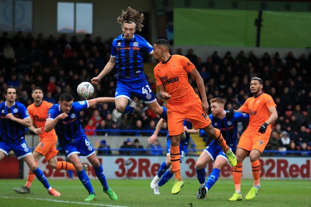 Rochdale’s Luke Matheson vies with Newcastle’s Isaac Hayden during their FA Cup third round match at the Crown Oil Arena in Rochdale January 4, 2020. — AFP pic