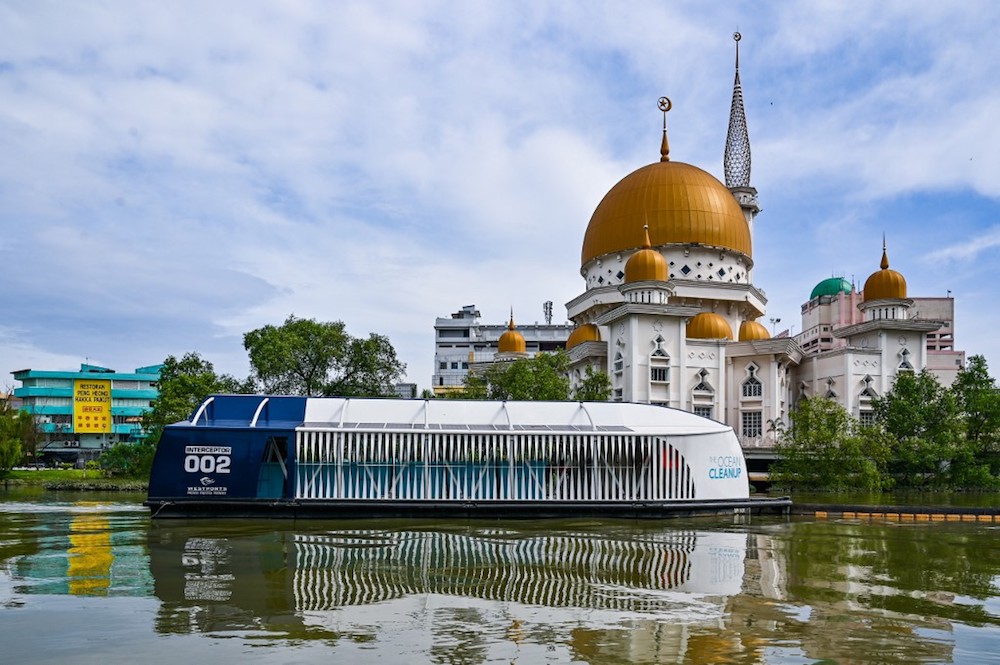 The garbage-picking Interceptor seen on the Klang river, in front of a mosque in Klang, December 17, 2019. u00e2u20acu201d AFP pic