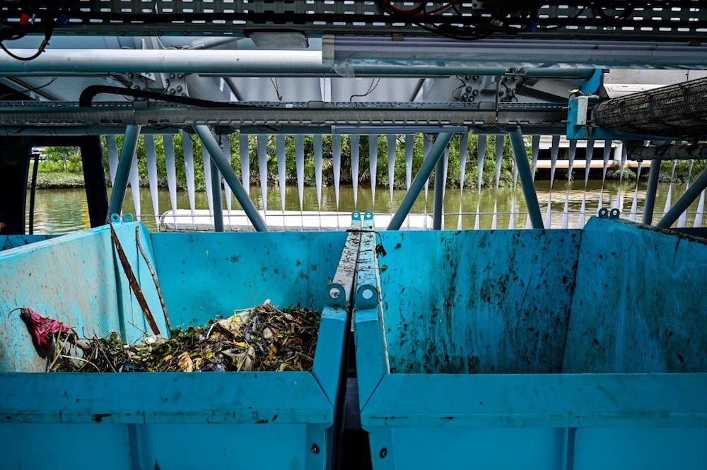 The garbage-picking Interceptor seen on the Klang river, in front of a mosque in Klang, December 17, 2019. u00e2u20acu201d AFP pic