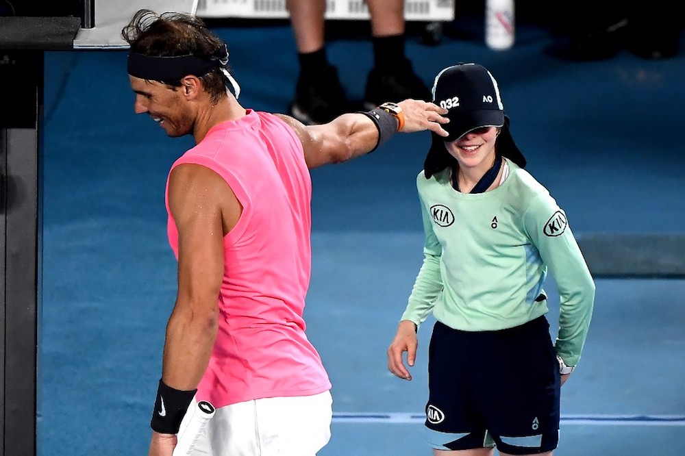 Spainu00e2u20acu2122s Rafael Nadal speaks with a ballkid who was hit by the ball during the menu00e2u20acu2122s singles match against Argentinau00e2u20acu2122s Federico Delbonis on day four of the Australian Open in Melbourne January 23, 2020. u00e2u20acu201d AFP pic