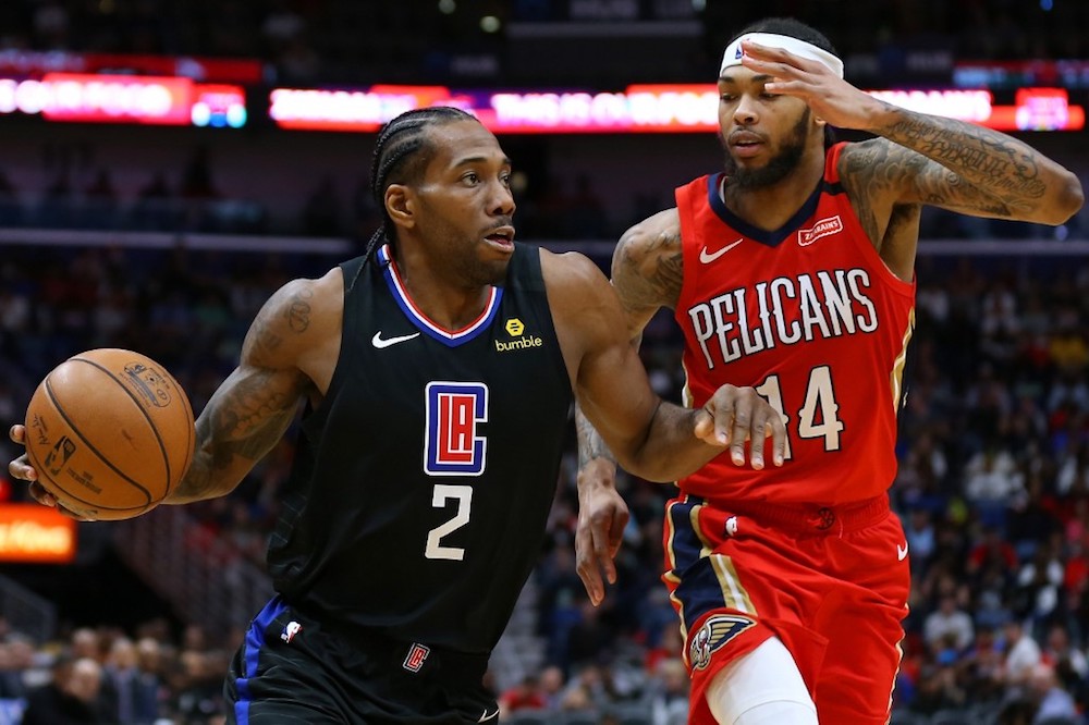 Kawhi Leonard of the LA Clippers drives against Brandon Ingram of the New Orleans Pelicans during the second half at the Smoothie King Centre in New Orleans January 18, 2020. u00e2u20acu201d AFP