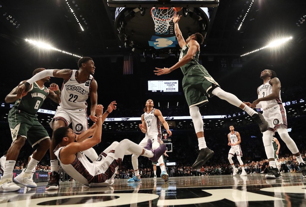 Giannis Antetokounmpo of the Milwaukee Bucks shoots against Spencer Dinwiddie of the Brooklyn Nets during their game at Barclays Centre in New York January 18, 2020. u00e2u20acu201d AFP pic