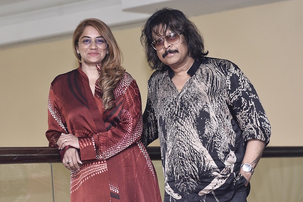 Indah Atelier CEO Mathumathi Manickvasagar Pilay with brand ambassador and renowned veena player Rajhesh Vaidhya during a press conference in Istana Hotel Kuala Lumpur, January 7, 2020. u00e2u20acu201d Picture by Miera Zulyana