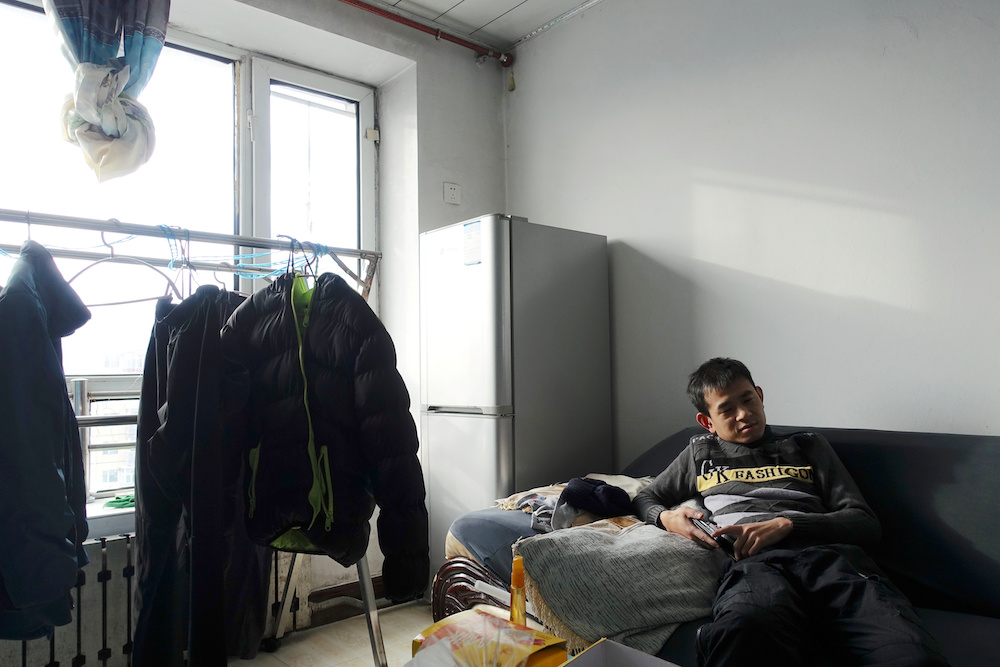 Ship mechanic Li Hai, 32, sits inside his flat during an interview with Reuters, in the coal city of Hegang, Heilongjiang province January 2, 2020. — Reuters pic