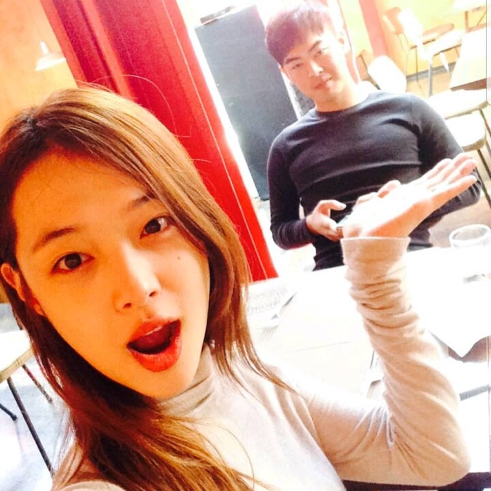 Sulli's elder brother Choi Dae-hee (background) had taken to social media to express his unhappiness with their father wanting more of Sulli's inheritance. u00e2u20acu201d Photo via Instagram/ k.d. bomba