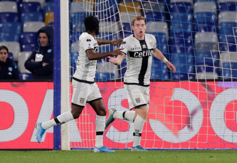Parmau00e2u20acu2122s Dejan Kulusevski celebrates scoring their first goal with Gervinho during the Serie A match with Napoli at Stadio San Paolo in Naples December 14, 2019. u00e2u20acu201d Reuters pic