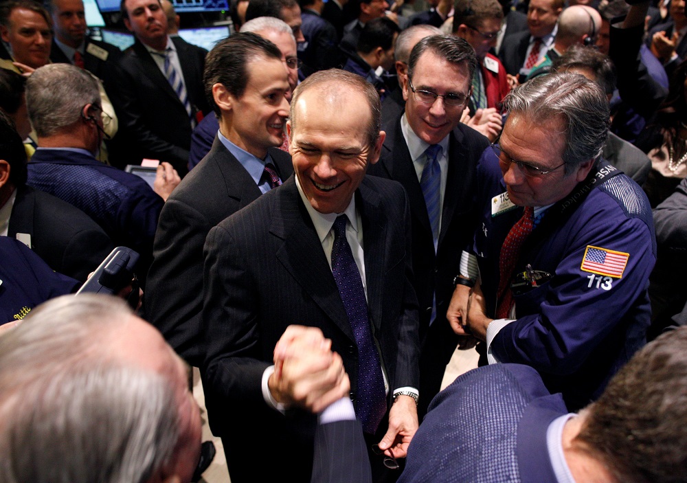 Nielsen CEO David Calhoun (centre) is congratulated after his companyu00e2u20acu2122s IPO opened, on the floor of the New York Stock Exchange January 26, 2011. u00e2u20acu201d Reuters pic