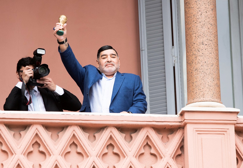 Diego Armando Maradona waves from the balcony of the Casa Rosada Presidential Palace after meeting Argentinau00e2u20acu2122s President Alberto Fernandez, in Buenos Aires December 26, 2019. u00e2u20acu201d Reuters pic