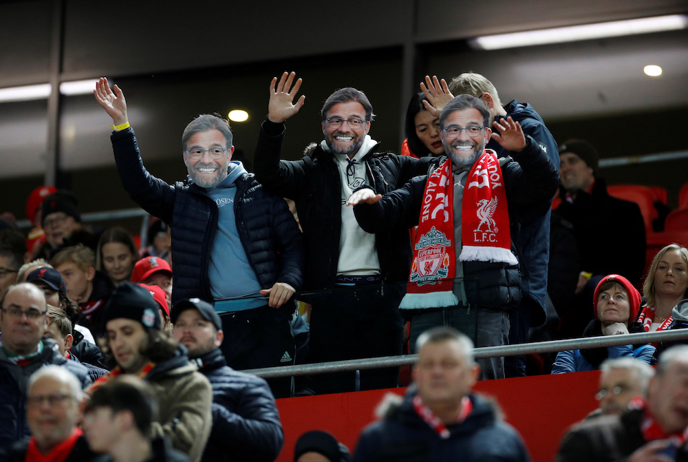 Liverpool fans wearing manager Jurgen Klopp masks before the Premier League match with Sheffield United at Anfield in Liverpool January 2, 2020. u00e2u20acu201d Reuters pic