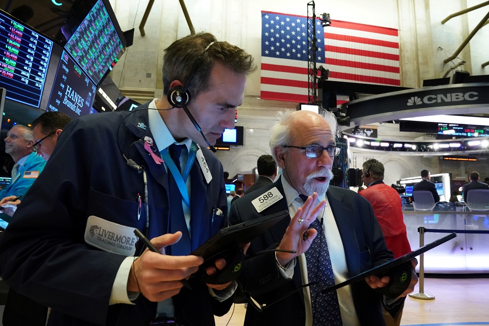 Traders work at the New York Stock Exchange January 2, 2020. u00e2u20acu201d Reuters pic 