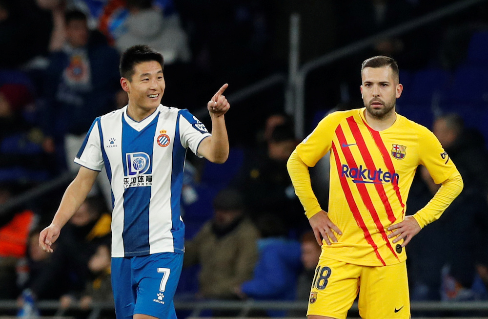 Espanyolu00e2u20acu2122s Wu Lei celebrates scoring their second goal as Barcelonau00e2u20acu2122s Jordi Alba looks dejected during their La Liga match at RCDE Stadium in Barcelona January 4, 2020. u00e2u20acu201d Reuters pic