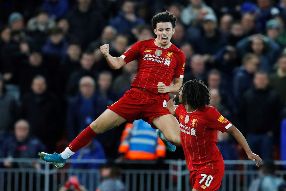 Liverpoolu00e2u20acu2122s Curtis Jones celebrates scoring their first goal with teammate Yasser Larouci during the FA Cup third round match with Everton at Anfield in Liverpool January 5, 2020. u00e2u20acu201d Reuters pic