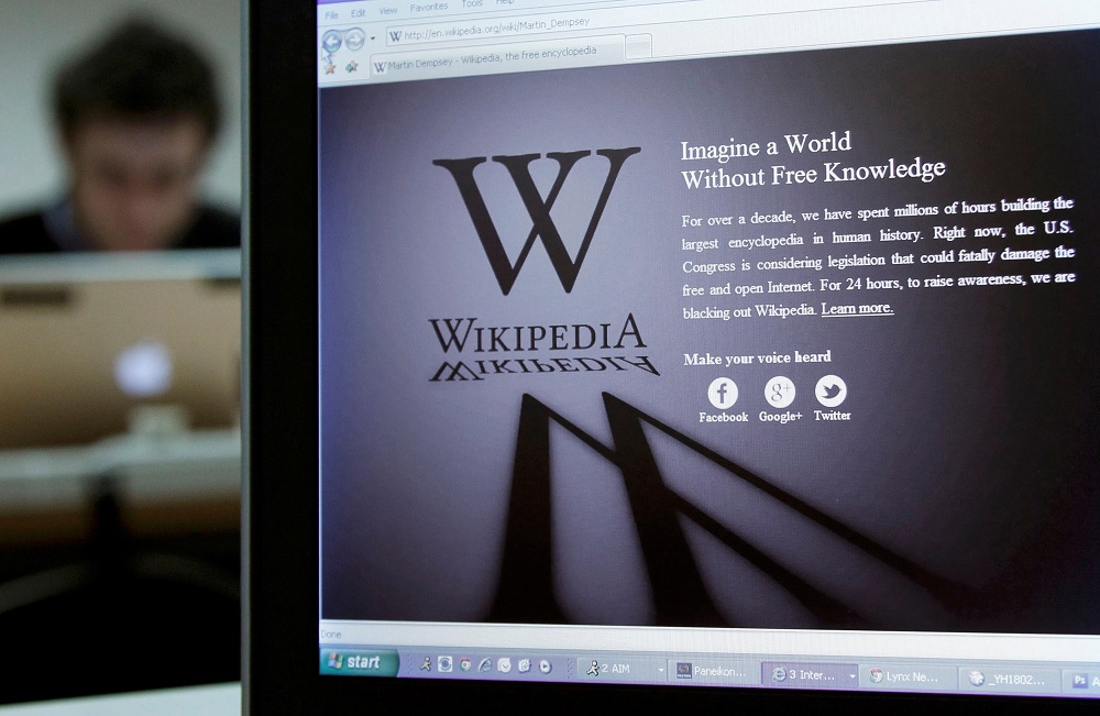 A reporter's laptop shows the Wikipedia blacked out opening page in Brussels January 18, 2012. u00e2u20acu201d Reuters pic