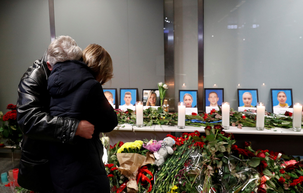Relatives of the flight crew of the Ukraine International Airlines Boeing 737-800 plane that crashed in Iran, mourn at a memorial at the Boryspil International airport outside Kiev, Ukraine January 8, 2020. u00e2u20acu201d Reuters pic