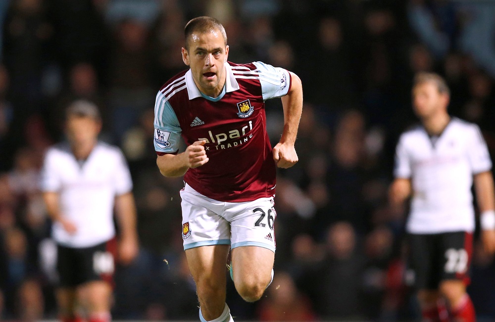 West Ham's Joe Cole celebrates scoring their third goal against Fulham at Upton Park November 30, 2013. u00e2u20acu201d Action Images via Reuters